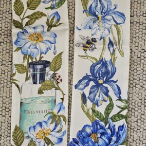 Blue irises, bees and a perfume bottle printed on the Louis Vuitton Fontaines Parfumees silk bandeau