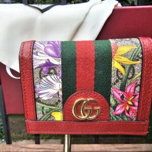 Gucci Ophidia compact wallet in GG Supreme Flora canvas with red leather trim, green and red Web stripe and gold Double G hardware