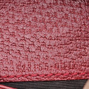 Style code 523155 embossed inside the Gucci Flora Web Ophidia compact wallet