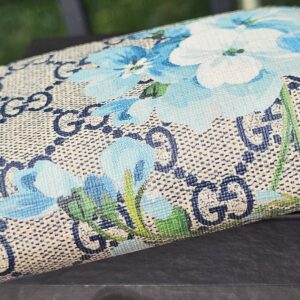 Close-up of the blue Blooms floral print on GG Supreme canvas