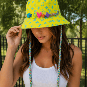 Louis Vuitton Virgil Abloh bucket hat worn with the yellow Monogram Playground side out