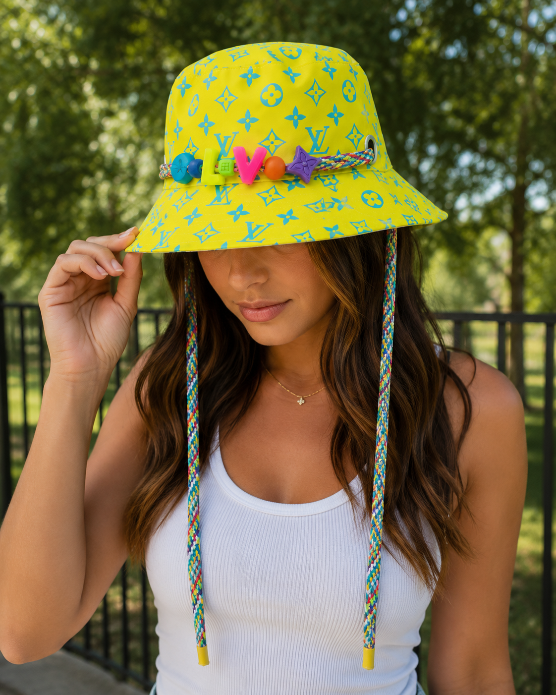 Louis Vuitton Virgil Abloh bucket hat worn with the yellow Monogram Playground side out