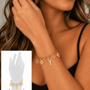 Illustrative model shot showing how a gold charm bracelet is worn, not a photo of the item for sale