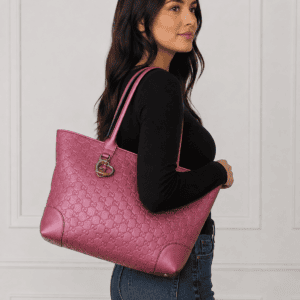 Gucci Guccissima Large Heart Bit tote carried on the shoulder, shown for scale