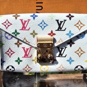 Front of the white Monogram Multicolor pouch with the S-lock closure