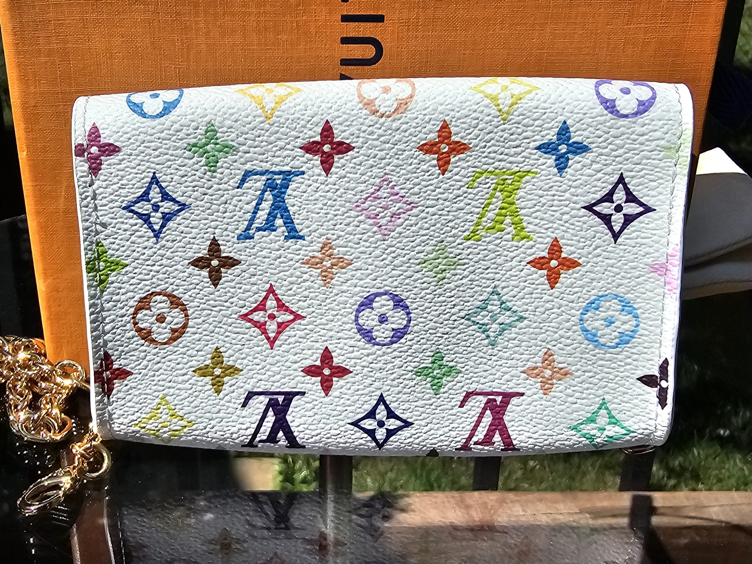 Reverse of the white Monogram Multicolor pouch