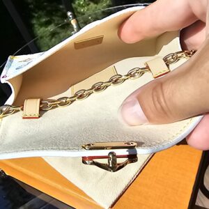 Pouch held open to show the clean cream interior