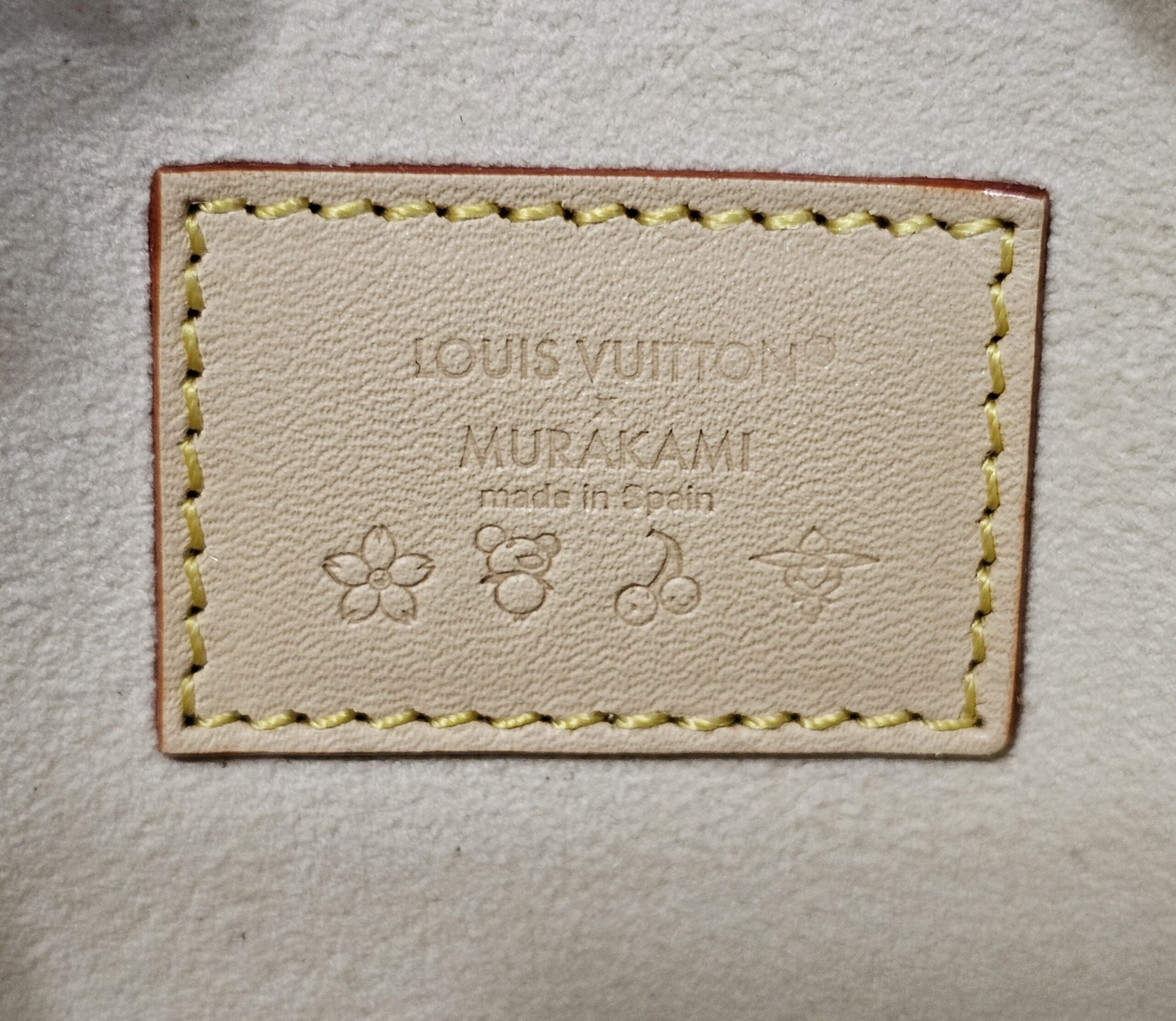 Interior patch stamped LOUIS VUITTON MURAKAMI made in Spain