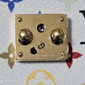 Gold-tone S-lock plate engraved LOUIS VUITTON