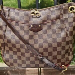 Louis Vuitton South Bank Besace in Damier Ebene canvas with brown leather trim and adjustable strap