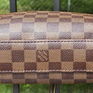 Base of the Louis Vuitton South Bank Besace in Damier Ebene canvas