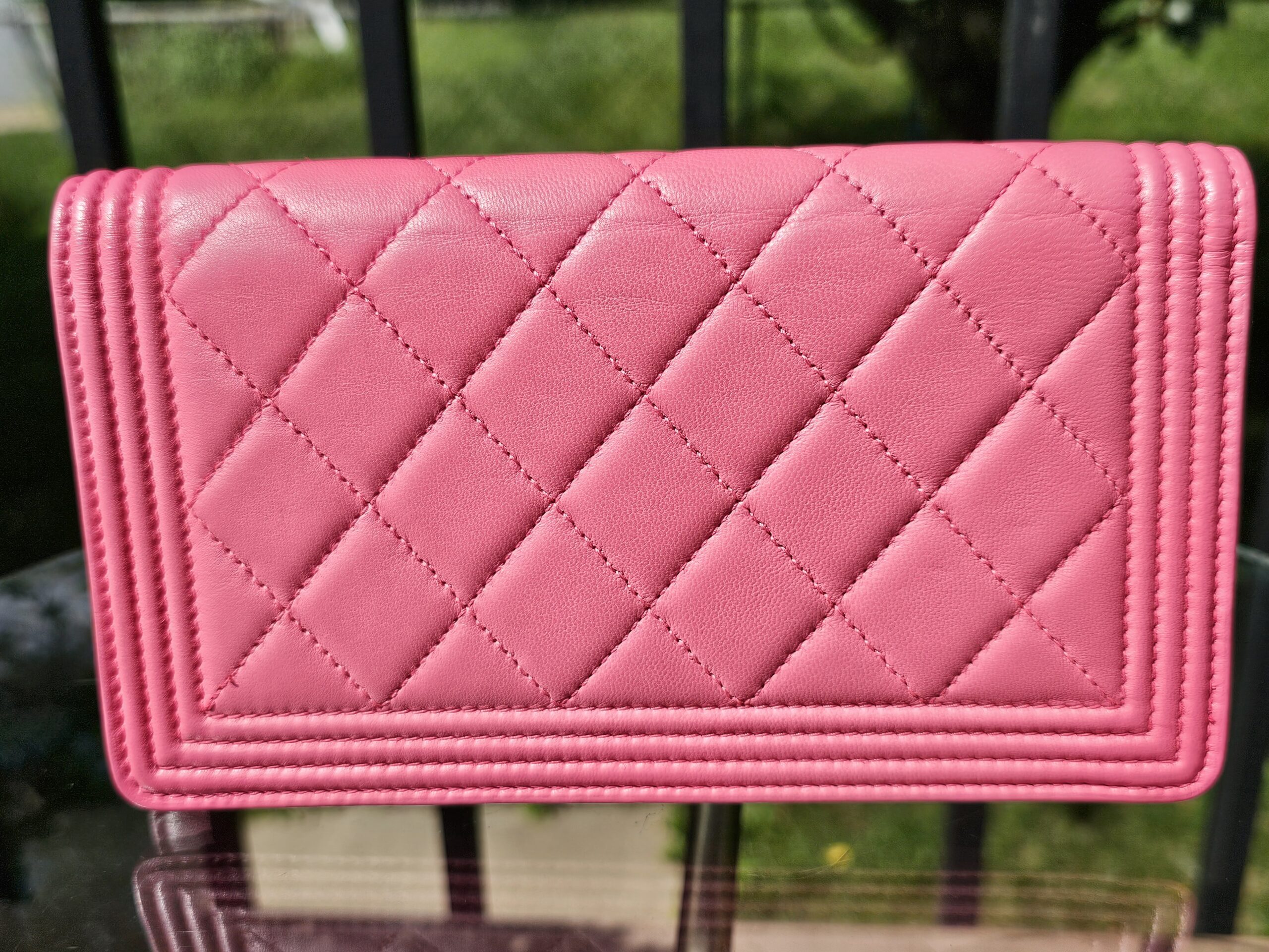 Back of the pink quilted Chanel Boy long wallet
