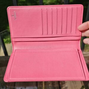 Card slots inside the Chanel Boy long wallet in pink leather