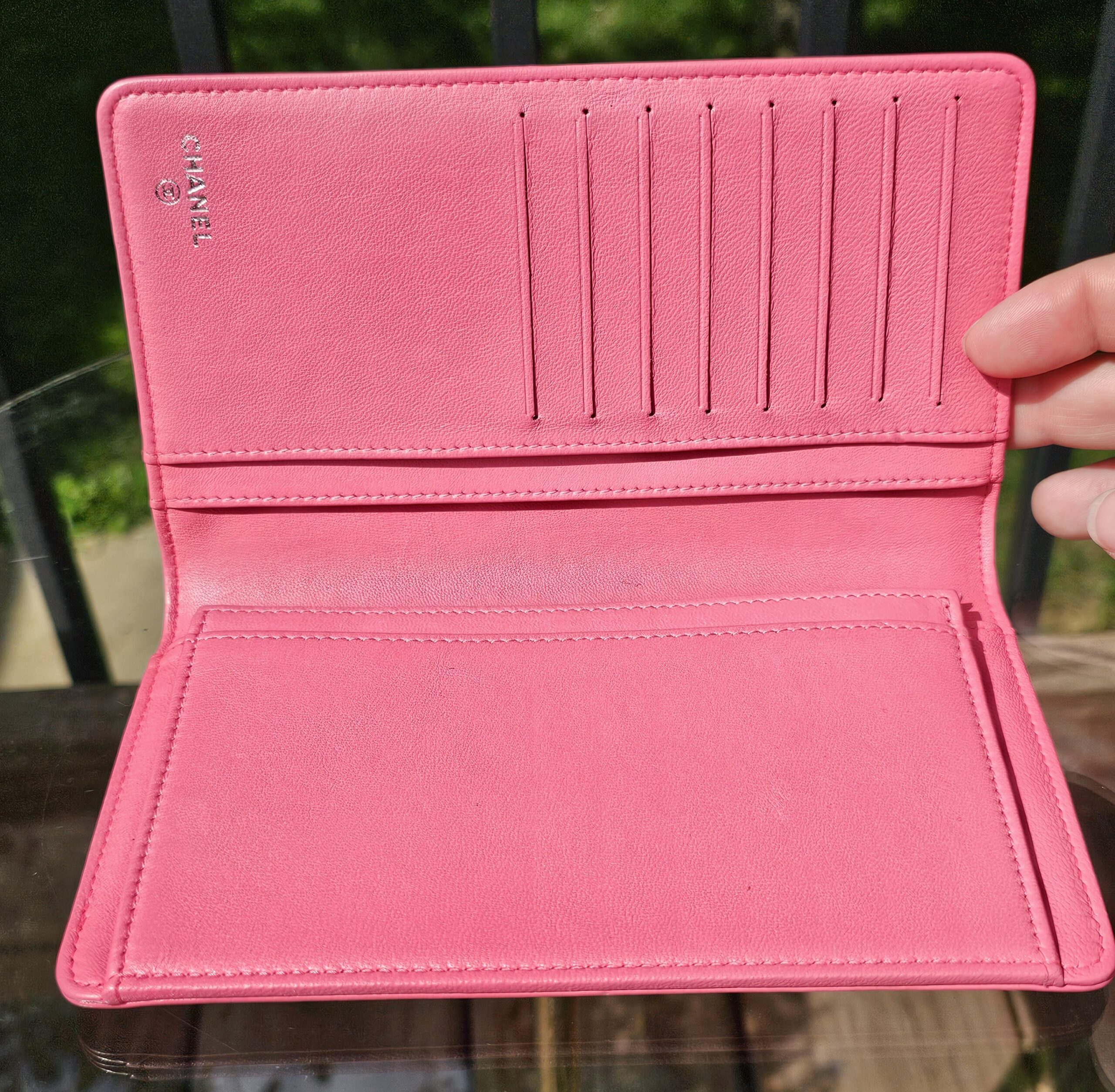 Card slots inside the Chanel Boy long wallet in pink leather