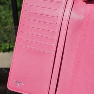 Full row of card slots inside the Chanel Boy long wallet in pink leather