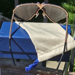 Front view of the Louis Vuitton LV Drive shield sunglasses showing the rose gold-tone frame and crystal V
