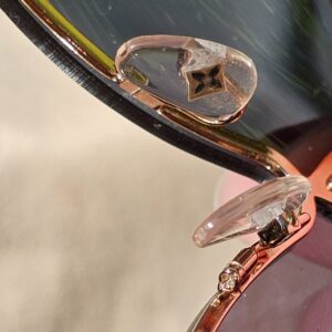 Bridge and nose pads of the rose gold-tone Louis Vuitton LV Drive sunglasses