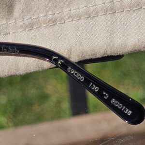 Right temple of the LV Drive sunglasses engraved Made in Italy, CE, 69 00, 130 and reference RG0138