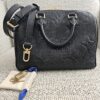 Louis Vuitton Monogram Empreinte Giant Speedy Bandoulière 25 Black - shown with its strap, lock, keys and dust pouch