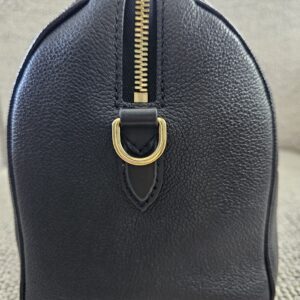Opposite side of the black Empreinte Speedy Bandouliere 25 showing the second D-ring