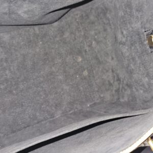 Interior pockets in the gray microfiber lining of the black Empreinte Speedy Bandouliere 25
