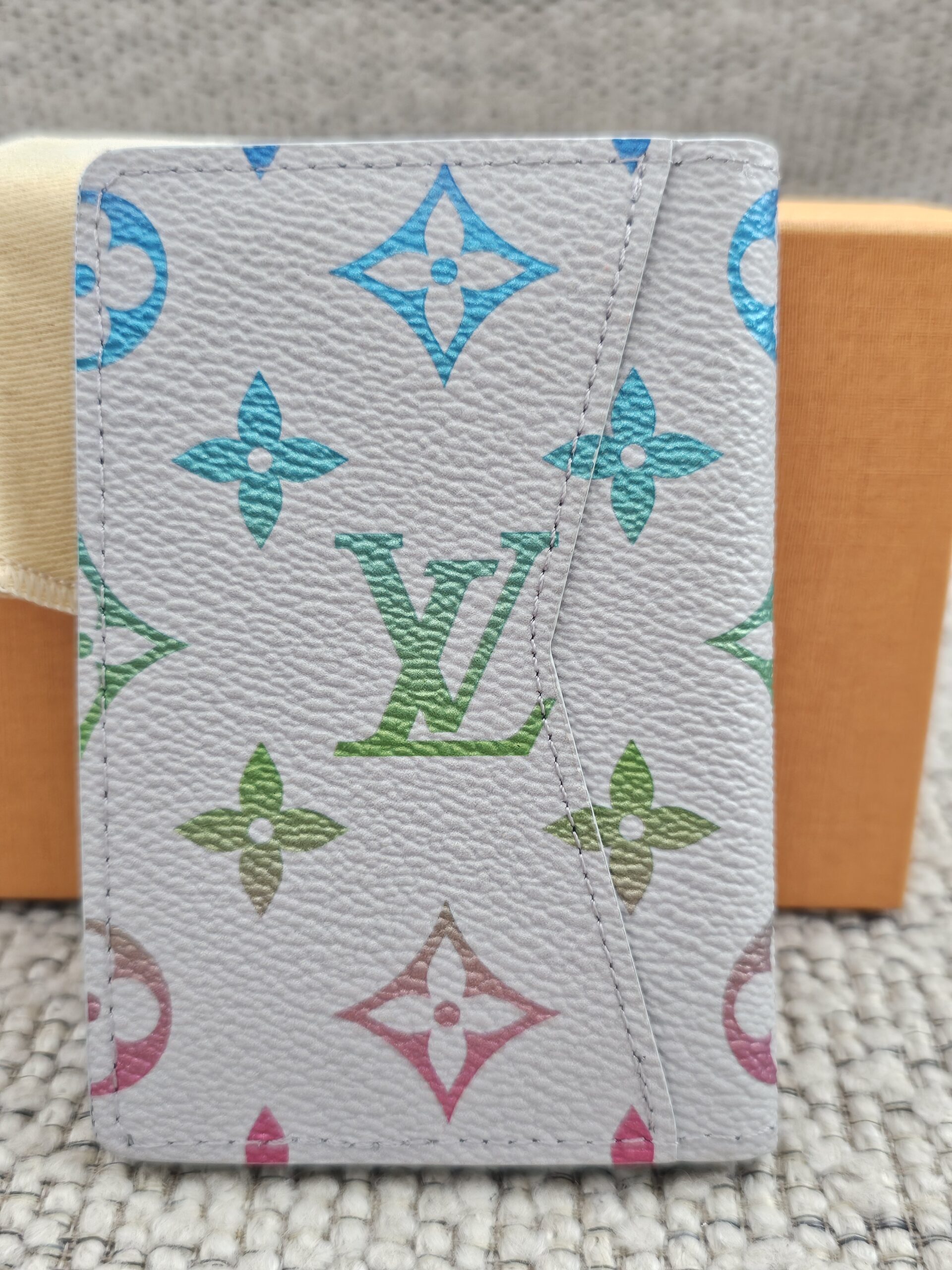 Back of the Louis Vuitton Iridescent Gradient Pocket Organizer showing the gradient Monogram print