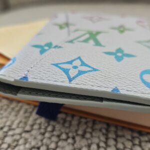 Louis Vuitton Iridescent Gradient Pocket Organizer shown with its Louis Vuitton box