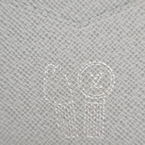 Embossed marking on the gray leather interior of the Louis Vuitton Pocket Organizer