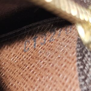 Date code stamp inside the Monogram Key Pouch