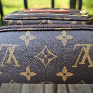 Base of the Louis Vuitton Cerises Mini Bumbag in Monogram coated canvas