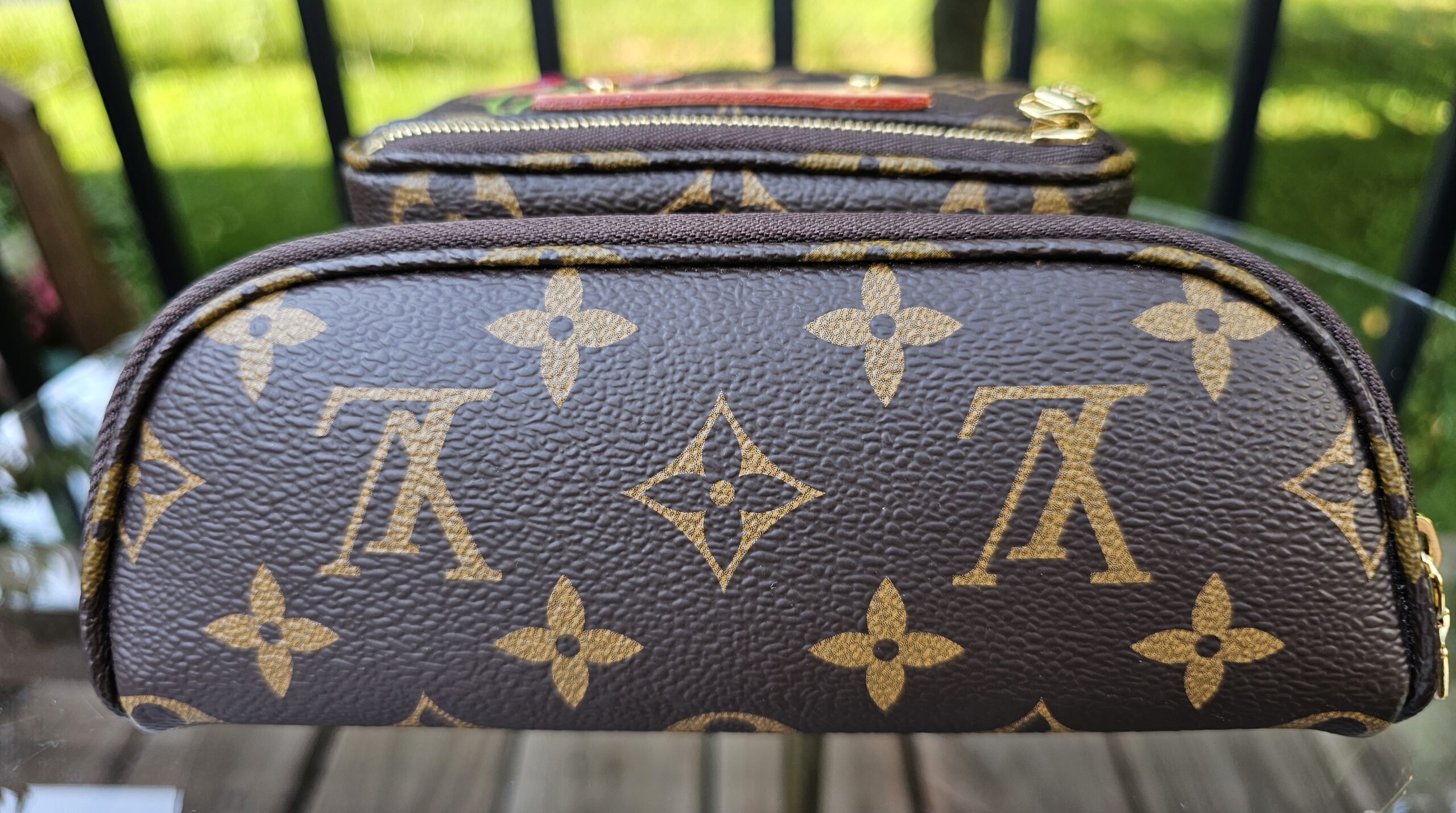 Base of the Louis Vuitton Cerises Mini Bumbag in Monogram coated canvas