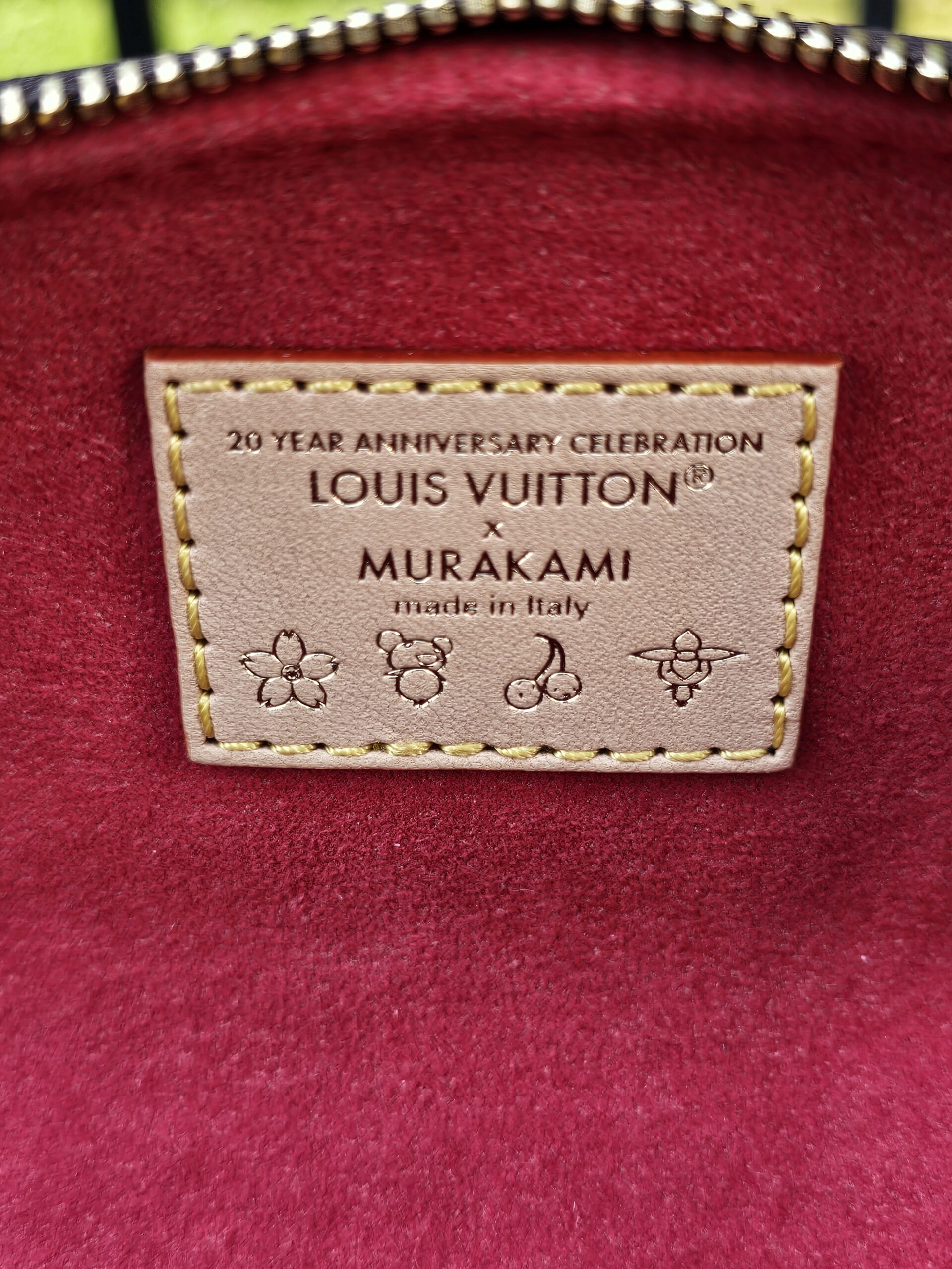 Interior tag reading 20 Year Anniversary Celebration, Louis Vuitton x Murakami, made in Italy