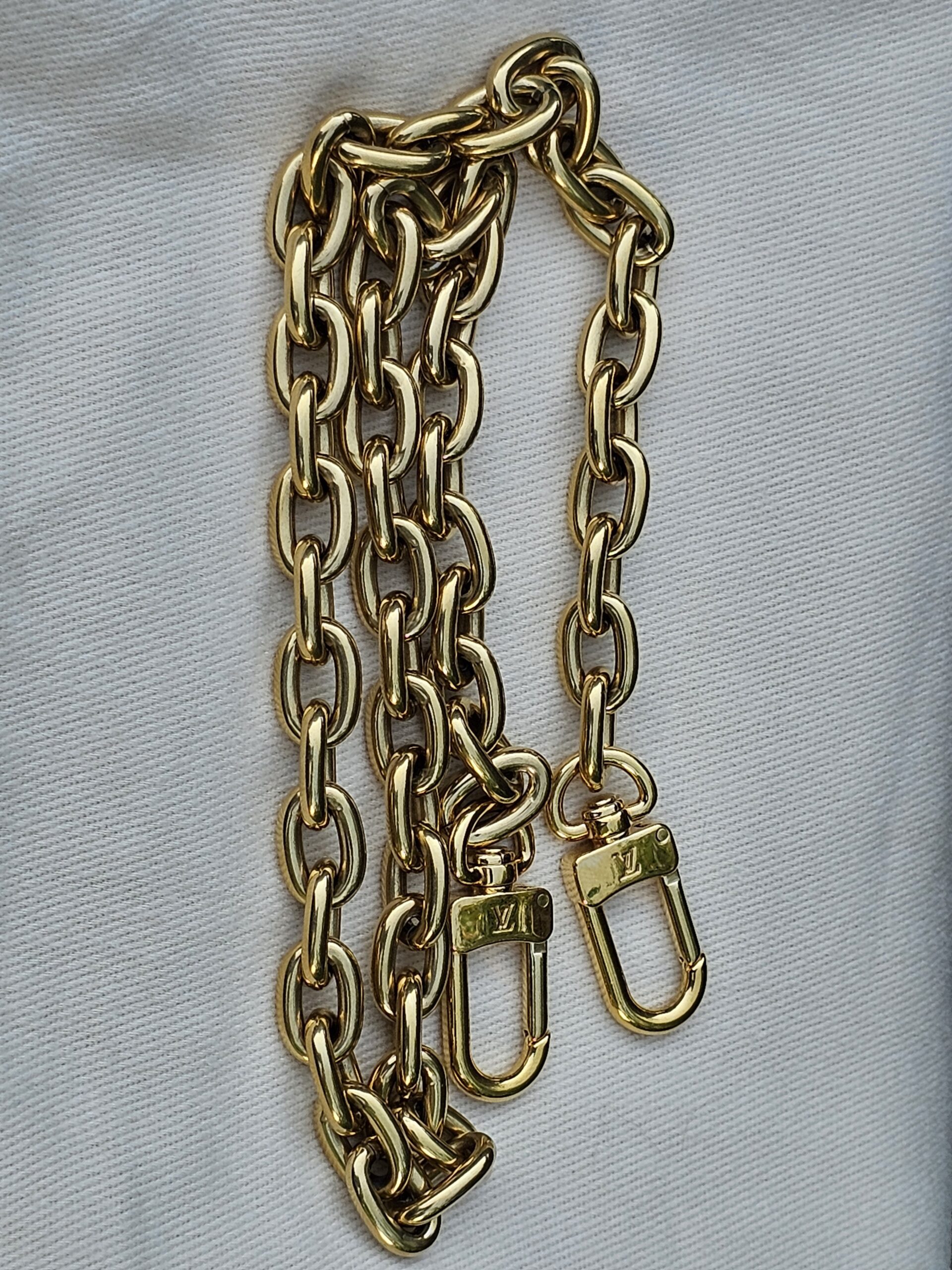 Removable gold-tone chain strap included with the Cerises Mini Bumbag