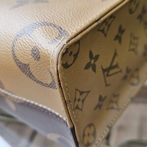Corner of the OnTheGo PM showing rubbing and surface marks to the coated canvas