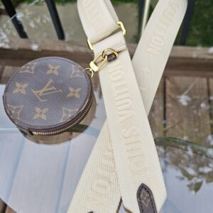 Louis Vuitton Monogram Round Pouch and Jacquard Adjustable Strap Cream - the round pouch clipped to the cream jacquard strap