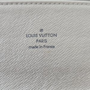 LOUIS VUITTON PARIS made in France stamp embossed inside the Mini Lin Sarah Wallet