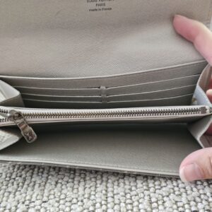 Gray Mini Lin Sarah Wallet opened to show the card slots and zipped coin compartment