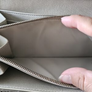 Interior of the Mini Lin Sarah Wallet showing the silver-tone coin compartment zipper