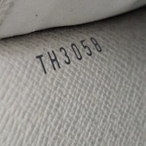 Date code TH3058 embossed inside the Louis Vuitton Monogram Mini Lin Sarah Wallet