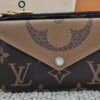 Louis Vuitton Reverse Monogram Recto Verso Card Holder - front view with the envelope snap pocket and gold-tone hook