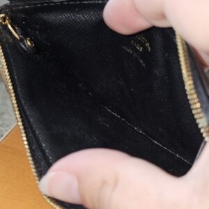 Interior zip compartment of the Monogram Reverse Recto Verso card holder