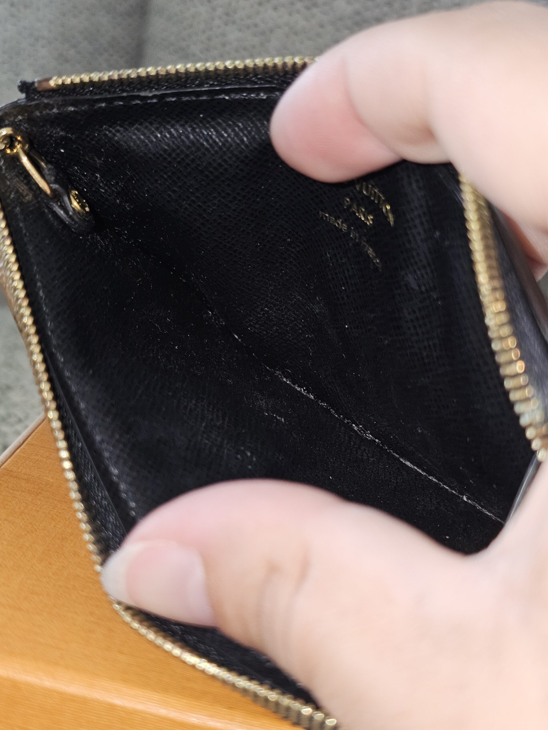 Interior zip compartment of the Monogram Reverse Recto Verso card holder