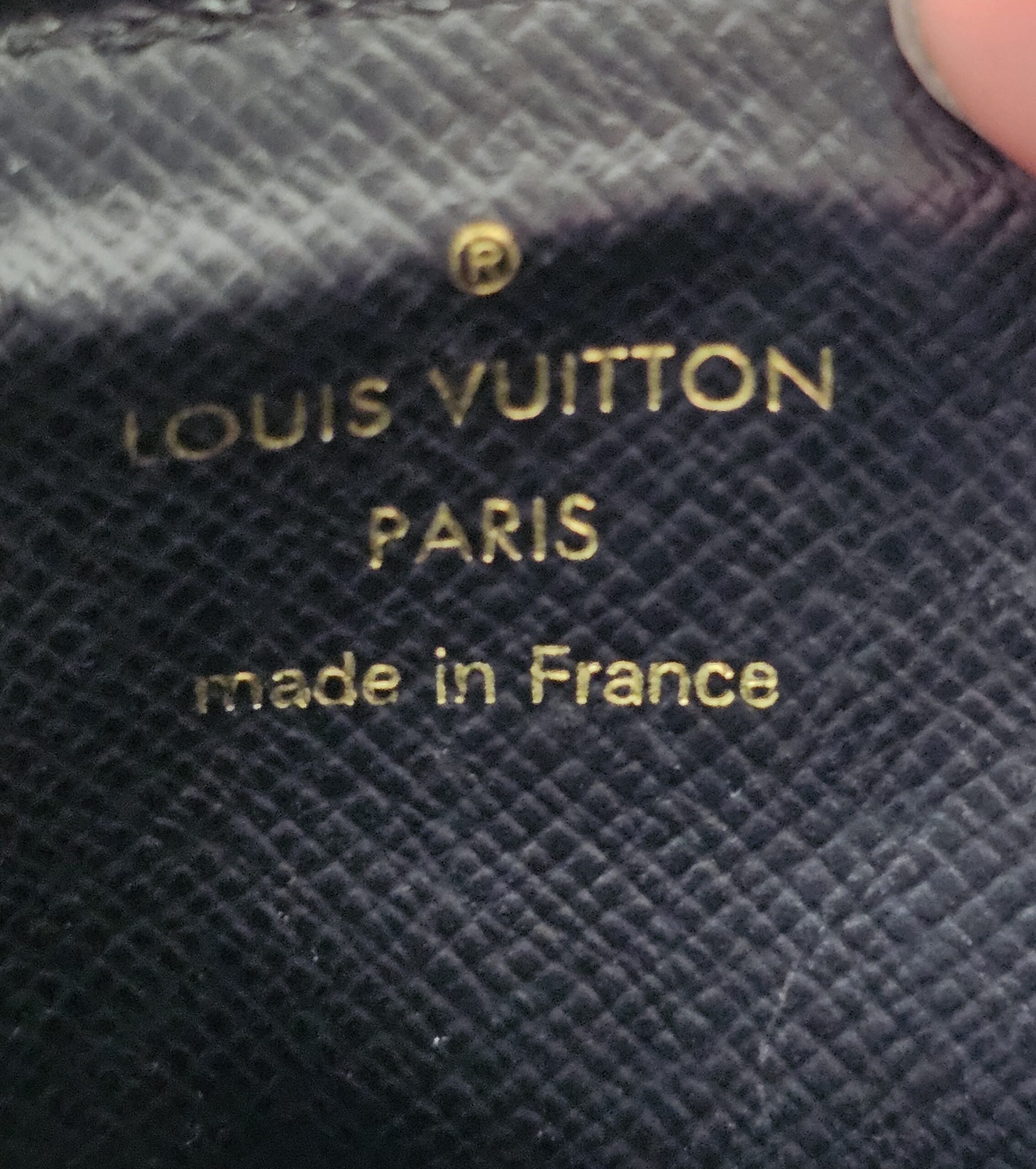 LOUIS VUITTON PARIS made in France stamp embossed inside the Recto Verso card holder
