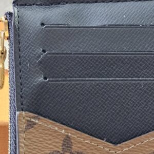 Close-up of the three card slots on the Monogram Reverse Recto Verso card holder