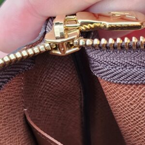 Interior slip pocket of the Louis Vuitton Monogram Key Pouch M