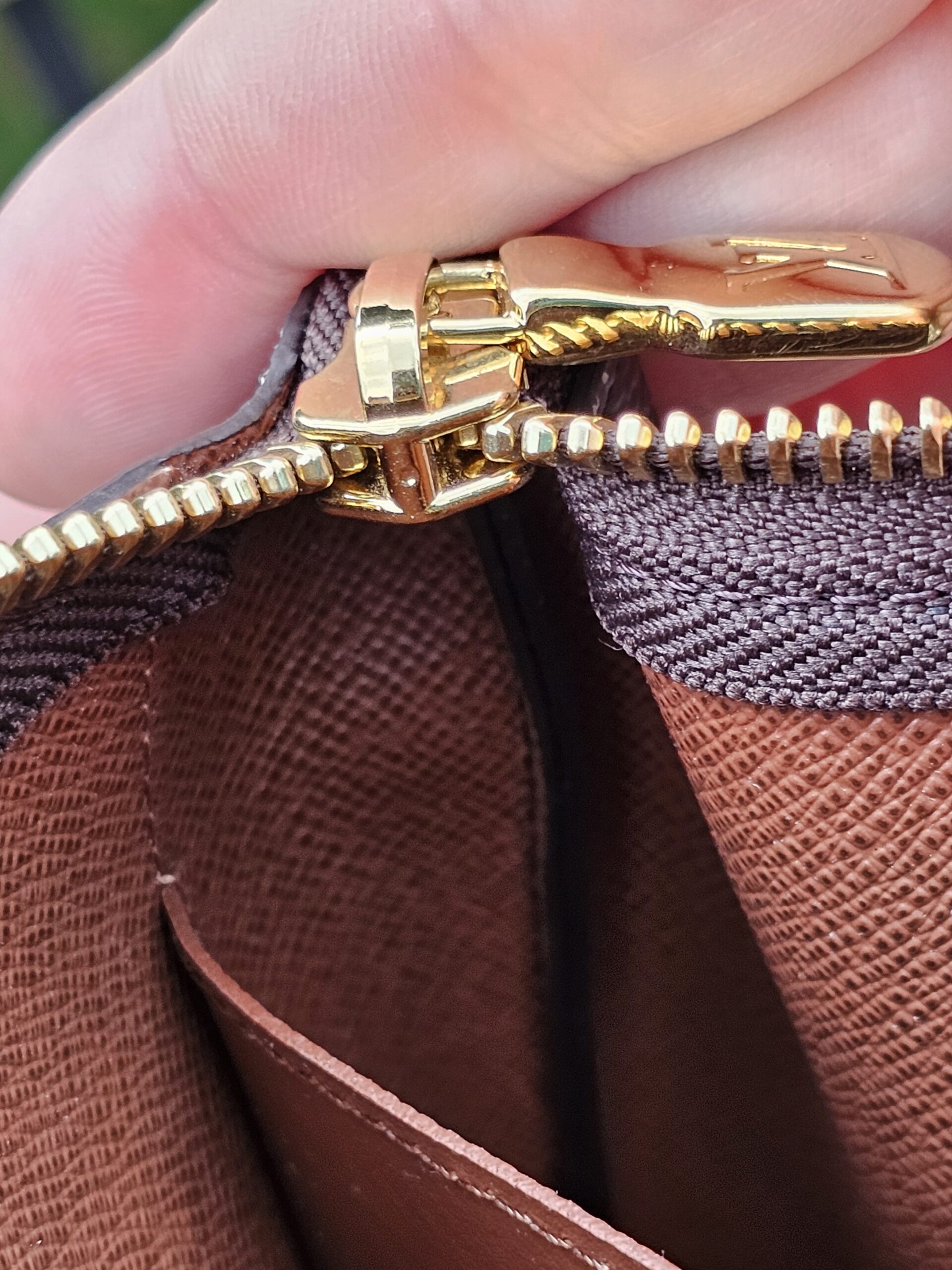 Interior slip pocket of the Louis Vuitton Monogram Key Pouch M