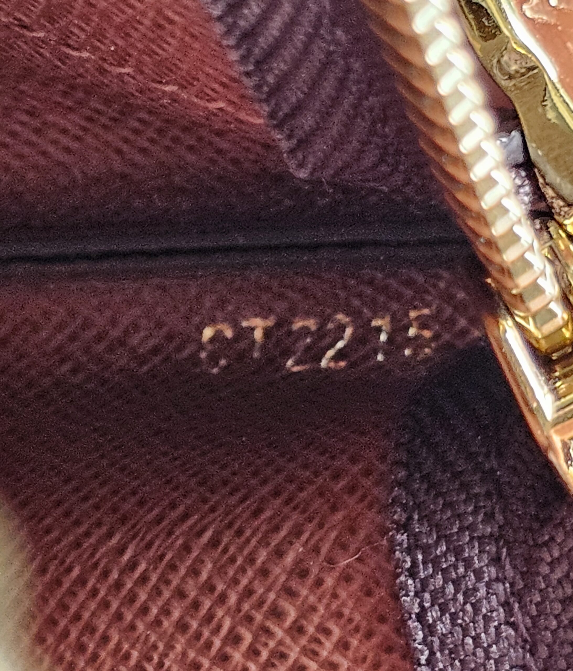 Date code CT2215 embossed inside the Louis Vuitton Monogram Key Pouch M