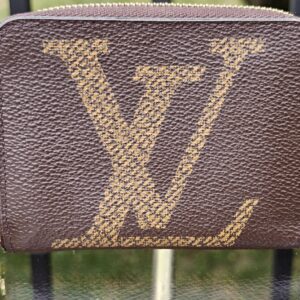 Louis Vuitton Monogram Giant Zippy Coin Purse - front view showing the oversized LV initials