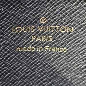 LOUIS VUITTON PARIS made in France stamp embossed inside the Monogram Giant Zippy Coin Purse
