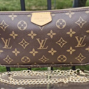 Louis Vuitton Monogram Multi Pochette Accessoires large pochette shown with the included gold-tone chain